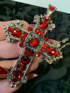 Silver Cross Pendant Jewelry For Party, Cross-shaped Rhinestone Jewelry For Parties, Cross Shaped Rhinestone Jewelry For Parties, Cross Shaped Rhinestone Party Jewelry, Silver Cross Jewelry For Party, Red Spiritual Cross Pendant Jewelry, Silver Cross Jewelry With Rhinestones, Jeweled Cross Jewelry Gift, Cross-shaped Jeweled Jewelry Gift