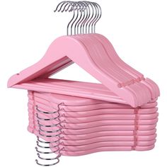 a pink plastic hanger with six pairs of clothes hanging from it's sides