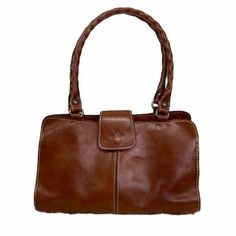 Patricia Nash leather shoulder bag with dustbag Lots of compartments/room Handles are wavy Brass accents Gorgeous saddle leather 13”L x 3”W x 8.5” T Strap drop 10” Saddle Leather, Brass Accents, T Strap, Shopping Cart, Cognac, Saddle, Leather Shoulder Bag, Dust Bag, Top Handle Bag