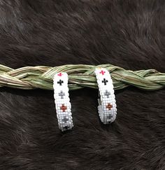 Authentic Beautiful Native American Indian Jewelry Navajo Zuni Hand Beaded with Seed Beads 1 1/2 inch Hoop Earrings Great for a  Gift❤️ Handcrafted by Navajo Artist Harriet Crosby Present in virtually every Native American tribe, the feather symbol is universally recognized as a representation of trust, strength, wisdom, freedom, and honor. Incorporated into many sacred pieces of Native American wear, the feather is easily one of the most respected symbols. White Southwestern Beaded Earrings For Festivals, Southwestern White Beaded Earrings For Festival, White Southwestern Style Beaded Earrings For Festival, Adjustable White Hoop Earrings For Festivals, White Hoop Earrings For Festival, White Round Bead Southwestern Earrings, Southwestern Style Beaded Dangle Hoop Earrings, Southwestern Style White Earrings For Festivals, Southwestern White Round Beads Jewelry