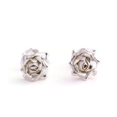 Rose Earrings, Sterling Silver Studs, Flower Earrings Individually handmade rose stud earrings with a small open rose design, a classic design for your be love . * Material: Sterling Silver * Size of Rose: Approx 1 cm (0.4in) diameter * Earring Type: Stud Earrings with butterfly back * Ready to Ship in 2-3 business day * Made in the United Kingdom PACKAGING: Comes uniquely packaged in my Magnolia Restrepo Style Case as shown in the last photo. Additional, I gift wrap all my boxes with golden pap Elegant Sterling Silver Rose Design Earrings, Silver Rose Design Jewelry For Wedding, Silver Wedding Jewelry With Rose Design, Sterling Silver Flower Earrings With Rose Design, Sterling Silver Rose Earrings With Rose Design, Sterling Silver Rose Design Flower Earrings, Elegant Rose Flower Earrings For Gift, Silver Earrings With Rose Design For Formal Events, Silver Rose Design Earrings For Formal Occasions