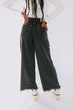 Details High-rise Exaggerated wide-leg fit Raw bottom hem Five-pocket style Button-front closure Denim jeans Sizing Approximate measurements: SIZE LENGTH INSEAM WAIST 24 40" 29" 24" 25 41" 30" 25" 26 41" 30" 26" 27 41.5" 30" 27" 28 42" 30.5" 28" 29 42.5" 31" 29" 30 42.5" 31" 30" 31 43" 31.5" 32" 32" 43" 31.5" 34" Fits true to size Fabric has little to no stretch Models are 5'10 wearing 26 and 5’11” wearing 28 Material 60% Cotton 40% LyocellMachine wash cold separatelyOnly non-chlorine bleachTumb Slouchy Jeans, Free People Jeans, Black Denim Jeans, Old West, Three Color, Denim Wash, Black Denim, Denim Jeans, Jeans Size