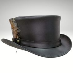 Adjustable Top Hat With Flat Crown For Formal Events, Adjustable Top Hat With Flat Crown For Formal Occasions, Formal Adjustable Top Hat With Flat Crown, Formal Adjustable Top Hat With Flat Bill, Black Leather Steampunk Top Hat, Fitted Black Leather Top Hat, Brown Western Top Hat For Formal Occasions, Brown Western Style Top Hat For Formal Occasions, Leather Hat Bands With Flat Crown For Formal Occasions