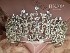 DESCRIPTION  Make your wedding look be as ( a bride with eye-catching and royal details) with this wedding tiara crown.  The variety of the stone shapes gives the tiara a wonderful sense of nobility and uniqueness. The marquise shape represents royalty and strong personality while the pear-shaped stones represent uniqueness and tears of joy. The third stone shape is the round shape which shows commitment To add to the glow of the stones, the crown is silver-plated which will be perfect with your Tiaras And Crowns Wedding, Swarovski Tiara, Sparkling Wedding, Stone Shapes, Silver Head Piece, Diamond Tiara, Strong Personality, Awesome Tattoos, Tiara Crown