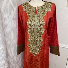 Pakistani Three Piece Suit.Brand Limelight.Shirt Fabric Is Jacquard Have Beautiful Embroidery.Color Peach.Brand New.Excellent For Eid And Dewali Sz M.Sz Approx Bust 21”.Waist 20” Hip 23” Length 44” Trouser 38” Elegant Traditional Wear With Multicolor Embroidery, Elegant Kurta With Multicolor Embroidery, Elegant Multicolor Embroidered Kurta For Festive Occasions, Elegant Multicolor Embroidery Kurta For Festive Occasions, Elegant Multicolor Embroidered Kurta, Elegant Jacquard Sets For Festive Occasions, Elegant Jacquard Long Sleeve Sets, Floral Embroidered Brocade Sets, Elegant Festive Jacquard Sets