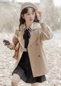 Essential trench coat in a classic and versatile color for easy matching. Features a relaxed silhouette, notched lapels, double breasted button closure, side pockets and waist sash in a short length. S: 39" chest, 27" lengthM: 40.5" chest, 27.5" lengthL: 42" chest, 28" length Short Trench Coat, Waist Sash, Shoe Gifts, Overall Dress, Sweater Blouse, Cardigan Jacket, Jeans Pants, Double Breasted, Sweaters & Cardigans