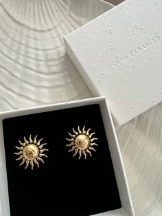 Club Paradiso Soleil Sun Moon Gold Earrings. Radiant as the sun’s warmth. Gold Plated Earrings As Summer Gift, Gold Plated Earrings For Summer Gift, Summer Gold Jewelry With Sun And Moon Design, Gold Sunburst Earrings With Sun Design, Elegant Gold Earrings With Sun Design, Elegant Summer Jewelry With Sun Design, Trendy Gold Sun Design Earrings, Gold Sun-shaped Earrings For Gift, Sun-shaped Earrings With Sun Design