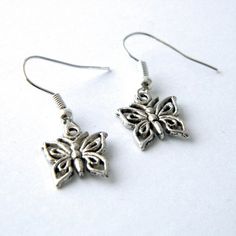 Silver Butterfly Earrings Dangle Earrings Silver Butterfly Charm Drop Earrings, Silver Butterfly Earrings With Ear Wire, Nickel-free Butterfly Shaped Silver Earrings, Nickel-free Silver Butterfly Earrings, Silver Butterfly Jewelry For Pierced Ears, Silver Butterfly Charm Earrings For Gifts, Silver Drop Earrings With Butterfly Charm, Nickel-free Adjustable Butterfly Earrings, Silver Earrings With Butterfly Charm For Gift