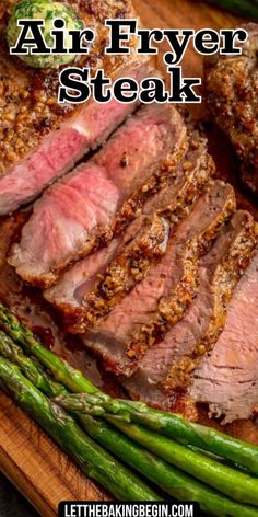 steak with asparagus on a cutting board and the words air fryer steak