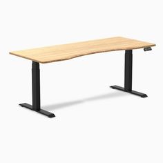 a wooden desk with black metal legs