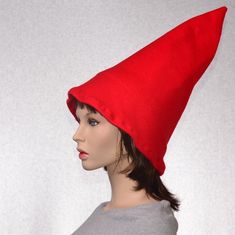 Red gnome hat with an extra wide brim. You wear this further back on your head to accommodate the extra girth of the brim. Tall and pointed made from soft fleece. Fits heads 22.5 and up. Upper portion of the hat is lined with interfacing so the hat stands tall. The bottom edge of this hat measures about 29 inches around, it is intended to be loose and flair out. Made and ready to ship, MG001464 Click here for the complete collection of holiday hats and caps. https://www.etsy.com/shop/MountainGot Red Brimmed Costume Hat One Size, Red Brimmed Hat For Costume, Hats And Caps, Gnome Hat, Holiday Hats, Hat Stands, Fantasy Costumes, Costume Hats, Long Red