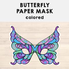 the butterfly paper mask is purple and blue