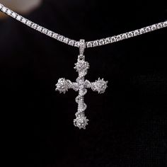 Introducing the Iced Spiked Cross Pendant featuring crystal hand-set stones. This head-turning piece is fully iced out, crafted in 14k White Gold, and features a spiked vine wrapped around the entire cross. Rock it with our 3mm Diamond Tennis Chain for the perfect drip to upgrade your fit! This product is guaranteed for life - GLD will repair the item should you experience any defects in craftsmanship or breakage. Specifications - 31mm x 44mm (Width x Height) - Bail: Fits up to 4mm Rope Chain -