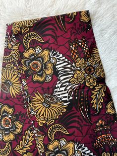 This African Fabric is high quality African print made from 100% cotton and it's 45 inches wide. It is used for making African Clothing, African quilts, & For Home decoration. FYI: Print is Double sided. The listing is for 1, 6 yards and Headwrap Each piece of fabric measures:  36in by 45in for 1 yard 216in by 45in for 6 yards 70in by 22in for Head wrap If you purchase more than one yard, you will receive one continuous piece. *If you require more than what I have listed, feel free to send me email. CARE INSTRUCTIONS: *DO NOT BLEACH *Hand wash with cold water and mild soap or Dry clean *Press with hot iron for a crispy look. Color may be different due to your monitor Traditional Floral Pattern Digital Prints, Patterned Ankara Batik Prints, Brown Ankara Fabric With Batik Print, Traditional Printed Multicolor Fabric, Patterned Batik Print Cotton Fabric, Patterned Cotton Fabric With Batik Print, Traditional Patterned And Printed Fabric, Ankara Fabric With Batik Print For Pattern Prints, Patterned Batik Print Fabric