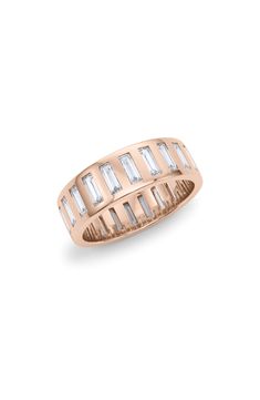 An elegant eternity ring showcases lab-created baguette diamonds bezel set on a gleaming 18-karat gold band. Total lab-created-diamond weight: 4.0ct. Color: D–F Clarity: VS 18k gold/lab-created diamond Made in the USA >Diamond Guide Fine Jewelry Rose Gold Baguette Cut, Luxury Baguette Diamond Eternity Band Gift, Rose Gold Baguette Cut Half Eternity Jewelry, Luxury Baguette-cut Gemstone Eternity Band, Rose Gold Stackable Baguette-cut Jewelry, Diamond Eternity Band, Diamond Guide, Baguette Diamonds, Eternity Band Ring