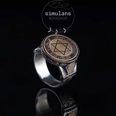 This exquisite Mystic Solomon's Seal Ring is a beautifully crafted piece made from 925 sterling silver. The focal point of the ring features the mystical Seal of Solomon, known for its powerful metaphysical properties. It is believed to have the ability to command and repel metaphysical entities according to the wearer's desires. The sides of the ring are adorned with intricate engravings, hand-carved to perfection, and enhanced with black onyx stones, adding to its mystical allure. The detailed Spiritual Sterling Silver Signet Ring With Gemstone, Mystical Engraved Silver Rings, Mystical Sterling Silver Open Ring, Symbolic Gemstone Signet Ring As Gift, Mystical Nickel-free Sterling Silver Rings, Mystical Sterling Silver Nickel-free Rings, Mystical Sterling Silver Rings As Gifts, Nickel Free Mystical Sterling Silver Ring, Mystical Sterling Silver Rings For Gift