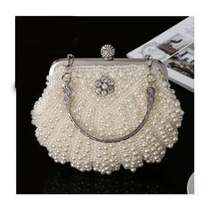 Pearl White Beaded Evening Bag For Party, Vintage Party Clutch With Pearl Handle, Elegant Pearl White Shoulder Bag For Party, Rectangular Pearl White Evening Bag For Party, Pearl White Beaded Shoulder Bag For Party, Pearl White Rectangular Evening Bag For Party, Pearl White Handheld Bags For Party, White Rectangular Evening Bag For Banquet, Pearl White Handheld Evening Bag For Events