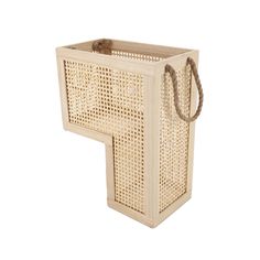 a wooden box with handles made out of rattan and rope on the bottom, in front of a white background