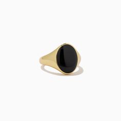 Black Onyx Oval Statement Ring in Gold | Uncommon James Modern Oval Black Enamel Rings, Sleek Black Everyday Jewelry, Black Minimalist Signet Ring For Everyday, Elegant Black Signet Ring For Everyday, Classic Black Oval Cabochon Ring, Classic Oval Black Enamel Ring, Classic Black Enamel Oval Ring, Elegant Black Everyday Signet Ring, Elegant Black Oval Dome Ring