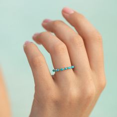 Turquoise ring silver, Dainty minimalist 925 sterling silver turquoise wedding band, Turquoise promise ring gift for her, Turquoise jewelry WE OFFER UNLIMITED PERIOD INSTALLMENTS PLAN This is a beautiful, stunning, feminine ring that works well for all occasions, styles, and ages. You will love it! Ring information: Main stones: Turquoise Approximate size: 4x2mm (4 stone) Approximate size: 2.0mm (5 stones) Approximate width of Band 1.2mm Metal type: 925 sterling silver Installment Payments We of Stackable Turquoise Ring Fine Jewelry, Stackable Turquoise Ring In Fine Jewelry Style, Adjustable 14k Gold Turquoise Jewelry, Adjustable Turquoise 14k Gold Jewelry, Dainty 14k Gold Turquoise Ring, Delicate Gemstone Ring Jewelry, Dainty Stackable Turquoise Ring, Turquoise Stackable Dainty Jewelry, Fine Jewelry Turquoise Gemstone