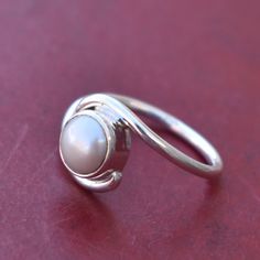 Beautiful Pearl Ring,Cultured South Sea Pearl Ring,Solid 925 Sterling Silver White Gemstone Ring,Handmade Jewelry,Promise Ring,Gift for her Gemstone : Pearl Stone Shape : Round Stone Color : White Stone Dimension (Approx) : 7 x 7 mm Ring Sizes : All Size Rings Available If you want to set the stones in 925 Solid Sterling Silver Like as earrings, pendant , Ring. I am always ready to make your custom design jewelry. Please contact me. --------------------------------------------------------------- Adjustable Sterling Silver Pearl Ring In Fine Jewelry Style, Elegant Stackable Sterling Silver Moonstone Ring, Elegant Stackable Moonstone Ring In Sterling Silver, Dainty White Pearl Ring In Sterling Silver, White Solitaire Stackable Rings As Gift, White Pearl Promise Ring With Birthstone, White Open Band Ring For Gift, White Open Band Ring As Gift, White Open Band Rings For Gift