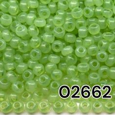 green glass beads with holes in the middle