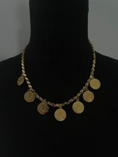 Simple xordol chain with  7 dime size liras attached Jewelry for women gifts Middle Eastern style accessories for weddings Kurdish clothes and necklaces earrings belts lira coin jewelry Arabic Balkan Kurdish jewelry for special occasions and every day wear You may also like this: https://www.etsy.com/listing/1497198187/stacked-lira-ringlira-co-jewelry?click_key=eefabd823aeb36fbc232af9deb1ee91f01a8d0d5%3A1497198187&click_sum=271029ef&ref=shop_home_active_23&frs=1 Kurdish Jewelry Jewelry for women Middle Eastern Necklace, Traditional Gold-plated Coin Pendant Necklace, Traditional Gold Plated Coin Pendant Jewelry, Vintage Coin-shaped Tarnish Resistant Jewelry, Vintage Tarnish-resistant Coin-shaped Jewelry, Vintage Tarnish-resistant Coin Jewelry, Round Plated Costume Jewelry Necklaces, Elegant Coin Pendant Choker Necklace, Elegant Coin Medallion Necklace With Chain