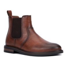 Indulge in timeless sophistication with our Ryder Chelsea boots, embodying effortless style and versatility. The classic silhouette, coupled with elastic side panels for easy on and off, ensures both comfort and elegance. Crafted with meticulous attention to detail, these boots add a touch of refinement to any ensemble, seamlessly blending with both casual and more formal attire. Step confidently through your day knowing Ryder Chelsea boots combine timeless charm with modern convenience, making Classic Winter Chelsea Boots For Formal Wear, Classic Winter Boots For Business Casual, Classic Winter Business Casual Boots, Classic Business Casual Winter Boots, Classic Brown Chelsea Boots For Winter, Classic Medium Width Ankle Boots, Masculine Workwear Boots For Fall, Masculine Fall Workwear Boots, Casual Chelsea Boots For Formal Occasions, Goodyear Welted