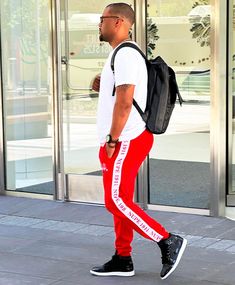 True to size Tapered joggers Embriodered logo Red Casual Activewear For Jogging, Casual Red Activewear For Jogging, Casual Red Gym Bottoms, Red Sportswear Joggers For Gym, Red Athleisure Sweatpants For Sports, Sporty Red Joggers For Gym, Sporty Red Sweatpants For Gym, Red Sporty Sweatpants For The Gym, Casual Cotton Activewear With Side Stripes