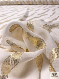 SKU: 16602 Content: Silk / Lurex Color: Light Ivory / Gold Width: 42 inches Elegant Cream Fabric For Party, Cream Elegant Party Fabric, Potatoe Recipe, Wavy Design, Light Ivory, Fabric Gifts, Fashion Fabric, Silk Chiffon, Fabric By The Yard