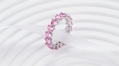 The name says it all, eternity is forever and this light pink heart stone eternity band is a perfect symbol for endless love! Gift this to a loved on this Valentines Day. This ring is a LIMITED EDITION Valentines special. So don't miss out because it wont be restocked once sold out! The Endless Love Ring has PREMIUM pink heart cut stones all around. It can be worn alone or stacked up with other rings to make a powerful impression. Enjoy the luxurious and Timeless design. Material: Full Sterling Stackable Cubic Zirconia Jewelry For Valentine's Day, Valentine's Day Stackable Cubic Zirconia Jewelry, Pink Stackable Cubic Zirconia Jewelry, Pink Cubic Zirconia Stackable Jewelry, Pink Stackable Rings For Valentine's Day, Valentine's Day Pink Stackable Rings, Pink Infinity Jewelry For Gifts, Pink Eternity Band For Promise Ring, Pink Crystal Ring For Valentine's Day Wedding