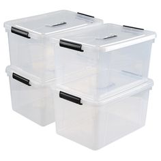 three clear storage containers with black handles