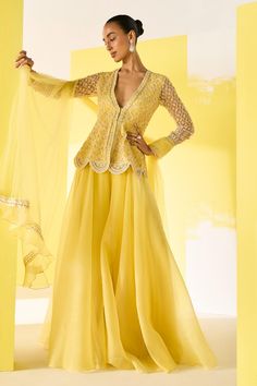 Shop for Ridhi Mehra Yellow Aafeh Embroidered Peplum Top Sharara Set for Women Online at Aza Fashions Maxi Dress Net Fabric, Wedding Sharara With Chikankari Embroidery And Peplum Style, Wedding Chikankari Embroidery Peplum Palazzo Set, Elegant Semi-stitched Yellow Sharara, Anarkali Style Wedding Top With Sheer Dupatta, Anarkali Top With Sheer Dupatta For Wedding, Elegant Tops With Dupatta For Reception, Elegant Reception Tops With Dupatta, Embellished Yellow Sharara For Eid