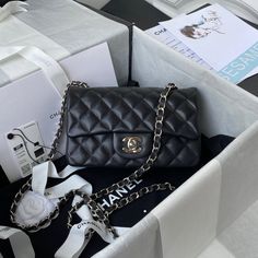 Description   CC Mini Classic Handbag Black For Women 7.9in/20cm  Rep 1:1  Measurements: 20 x 12 x 7 cm / 7.9 x 4.7 x 2.8 inches (Length x Width x Height)  Chain  Black  Gold-toned hardware  Include box, dust bag.  This product is of the best quality. Mini Classic, Chanel Mini, Classic Handbags, Handbag Black, Black Handbags, Chanel Bag, Fashion Statement, Luxury Bags, Fashion Bags