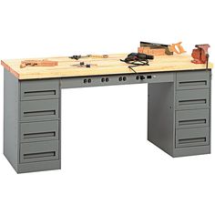 a workbench with many drawers and tools on the top, all in grey