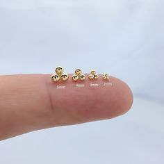 Introducing our elegant 14K gold Dot Stud Earrings, specially designed for cartilage  piercings. These exquisite studs feature a convenient push-back closure, ensuring  both comfort and security Material 14K Yellow Gold + Implant Grade Titanium Push Back Guaranteed to be genuine 14K solid gold, not plated or filled Closing method: push-back type Size: 3.5mm.5mm.7mm ★★This item is for ONE piece, NOT one pair ★★ ★★Wearable on Cartilage, Helix, Earlobes, Inner Conch or Nose★★  SHIPPING ADDRESS ●All Dainty Gold Cartilage Earrings Tarnish Resistant, Gold Dainty Tarnish-resistant Cartilage Earrings, Dainty Gold Tarnish-resistant Cartilage Earrings, Gold Minimalist Tarnish-resistant Cartilage Earrings, Minimalist Gold Hypoallergenic Cartilage Earrings, Dainty Gold Cartilage Earring, Dainty Gold Single Cartilage Earring, Minimalist 14k Gold Filled Piercings, Delicate Gold Hypoallergenic Cartilage Earrings