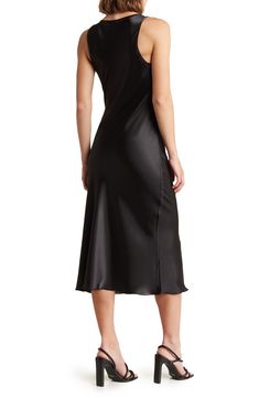 Satin fabric lends shine to a stem-baring midi dress with a flared hem that elegantly drapes off your figure. U-neck Sleeveless 100% polyester Machine wash, line dry Made in the USA of imported fabric U Neck, Satin Fabric, Nordstrom Rack, Neck Dress, Midi Dress, Nordstrom, Satin, Fabric, Black