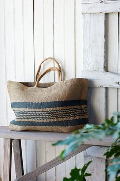 Handwoven from jute, this striped jute shopper is a durable solution to single-use bags. The timeless design work is created by hand using wooden looms, while their color palettes are achieved using natural dyes. Made by artisans working within a fair trade collective from a woman-owned brand. Picnic Tote, Shopping Totes, Market Tote Bag, Perfect Handbag, Pretty Bags, Market Tote, Jute Bags, Unique Bags, Natural Dyes