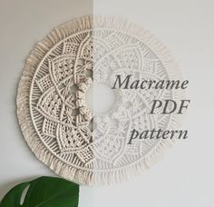 the macrame pdf pattern is displayed on a wall next to a plant