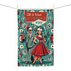 an old fashioned christmas card hanging on a clothes line