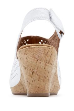 Get comfort and style in this cushioned perforated leather wedge sandal.Sizing: True to size. M=standard width, W=wide width . Open toe. Leather construction. Perforated detail. Hook-and-loop side strap closure. Cork wedge heel. Approx. 2.7/8" heel, 0.5" platform. Imported Leather upper, rubber sole Wide Width Sandals, Perfume Gift Sets, Fragrance Gift, Leather Wedge Sandals, Perforated Leather, Fragrance Gift Set, Fragrance Design, Leather Wedges, Wedge Sandal