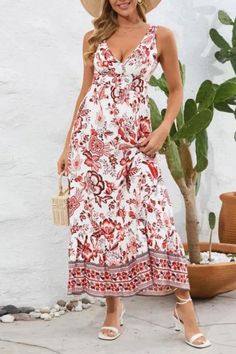 "Embrace the beauty of summer in this Women's Floral Maxi Dress. With a flattering V-neck and sleeveless design, it's perfect for beach days or outdoor events. Radiate effortless charm and elegance with this breezy and feminine dress, ideal for soaking up the sun in style." Bohemian V-neck Sleeveless Dress For Day Out, Holiday V-neck Floral Print Beach Dress, Casual V-neck Maxi Dress For Holiday, Beach Season V-neck Sundress, White Printed V-neck Sundress, Spring V-neck Sundress Halter Dress, V-neck Sleeveless Dress For Summer Beachwear, White V-neck Sleeveless Dress For Beach, Summer Holiday V-neck Sundress