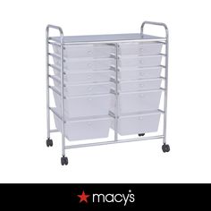 a large metal cart with six white bins on it's sides and the words macy's above it