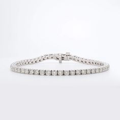 5.00 Ct. T.W. White Diamond Bracelet White Gold #diamondbracelt #jewelry #conflict free White Diamond-accented Tennis Bracelet For Weddings, Luxury Everyday Diamond Bracelet, Tarnish Resistant, Dazzling White Gold Diamond-cut Tennis Bracelet, Silver Tarnish-resistant Cubic Zirconia Tennis Bracelet, Silver Tennis Bracelet With Diamond-cut Cubic Zirconia, Tennis Bracelet Diamond, Tennis Bracelet, Conflict Free Diamonds, White Diamond