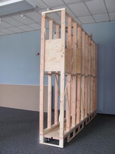 a wooden crate sitting in an empty room