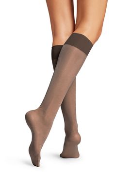 These knee-highs are delightfully translucent and easy to keep in place all day long with a wide cuff that won't dig in. Polyamide/elastane Machine wash, line dry Imported Nylon Knee-high Socks, Sheer Stretch Knee-high Legwear, Knee-high Stockings, Fitted Nylon Knee-high Socks, Elegant Stretch Mid-calf Legwear, Sheer Fitted Nylon Socks, Fitted Nylon Elegant Socks, Fitted Nylon Knee-high Stockings, Fitted Knee-high Nylon Stockings