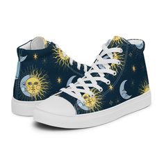 🌞 Step into the cosmic realm of fashion with our Celestial Sun and Moon High Top Canvas Shoes! 🌜 Crafted with love and care, these shoes are not just footwear; they're an expression of your unique style and connection to the universe. ��🌌 👟 Constructed from 100% polyester canvas with an ethylene-vinyl acetate (EVA) rubber outsole, our hi tops are built for both comfort and durability. 🛠️ The breathable lining and soft insole ensure that every step feels like walking on clouds, while the faux Boho Sneakers, Sun And Moon Design, Celestial Sun And Moon, Hippie Shoes, Celestial Sun, Shoes Unique, Tops Trendy, Moon And Sun, On Clouds