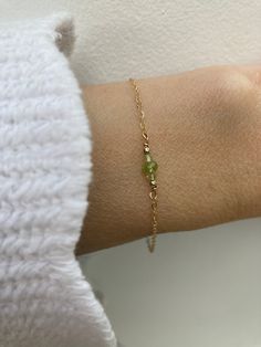 Beautiful gemstones are combined with a delicate chain to create this bracelet that is also the birthstone of anyone born in the month August. D E T A I L S  *Made with AA grade micro-faceted peridot beads. *on a sparkly 14k gold filled chain. Sterling silver is also available. *Gold filled is a wonderful alternative to solid gold and unlike gold plating does not rub off. *Spring clasp closure. *Bracelet comes care instructions and a matching crystal information card and is ready for gifting. S Lime Green Birthstone Jewelry For Gifts, Lime Green Birthstone Jewelry Gift, Dainty Green Birthstone Jewelry, Green Chain Bracelet For May Birthstone Gift, Minimalist Peridot Birthstone Jewelry, Lime Green Jewelry For May Birthstone Gift, Delicate Green Birthstone Jewelry, Peridot Birthstone Jewelry Gift, Dainty Green Peridot Jewelry