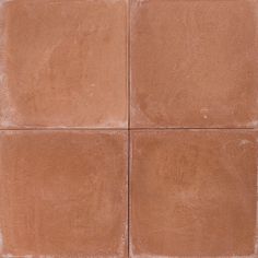 four square brown tiles arranged in the same pattern