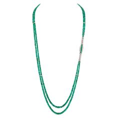 This long and sleek necklace is as striking as it is comfortable. The designer happened across a vintage treasure made with 2.3 Carats of Precision Set Emeralds and surrounded with 2.66 Carats of Round Brilliant and Baguette Diamonds. The lines of the piece inspired this long two-strand necklace pairing 215 Carats of smooth Rondelle Emeralds ranging from 2.5 - 8 mm held together perfectly with an additional 4 spacer bars crafted in the same sleek baguette design as the focal point adding an addi Moms Bracelet, Meme Design, Antiques For Sale, Emerald Necklace, 3 Carat, Multi Strand Necklace, Baguette Diamond, Emerald Diamond, Strand Necklace